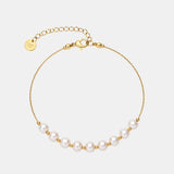 Aprille – Elegant Pearl Accent Chain Bracelet in Gold
