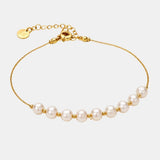 Aprille – Elegant Pearl Accent Chain Bracelet in Gold