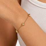 Estella – Triple Heart Charm Bracelet