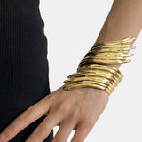 Rowena – Gold Abstract Ripple Open Bracelet