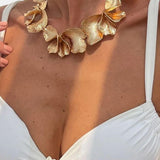 Solenne – Textured Flower Petal Necklace in Gold